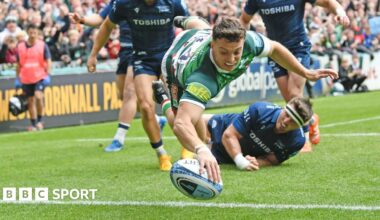 Adam Radwan dives over for his first try against Sale Sharks