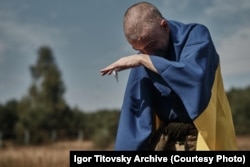 Ihor Titovskiy reacts upon his return to Ukraine after more than two years in Russian captivity.