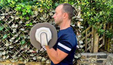 James Frew performing biceps curls with the Centr Smart Stack Adjustable Dumbbells