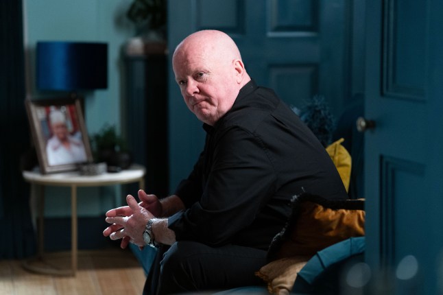 Phil looks deep in thought in EastEnders