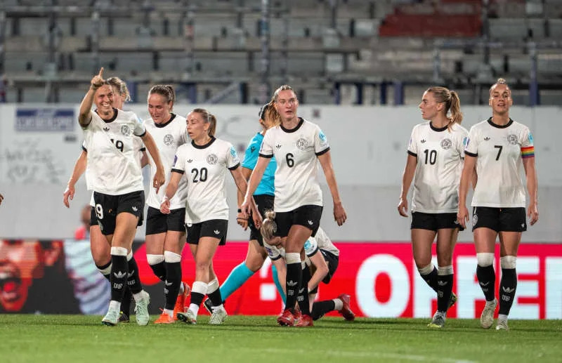 Germany's Sydney Lohmann (L) celebrates scoring her side's fifth goal with teammates during the Nations League Women soccer match between Austria and Germany at the Generali Arena. Georg Hochmuth/APA/dpa
