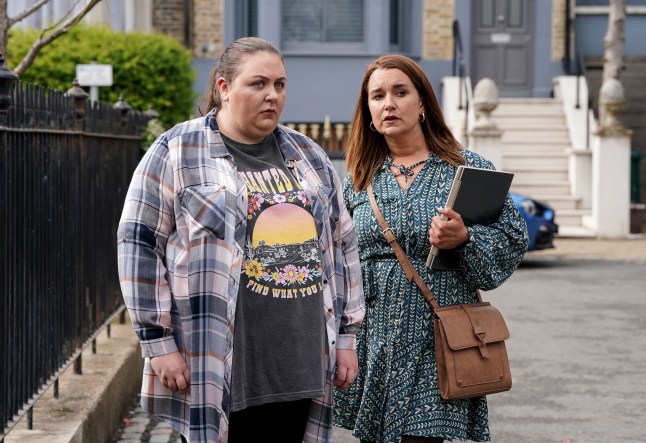 Bernie stands with Vicki in The Square in EastEnders