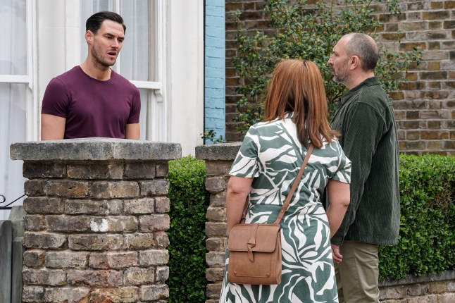 Zack talks to Vicki and Ross at the front door in EastEnders