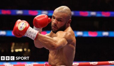 Eubank Jr throwing a left hook