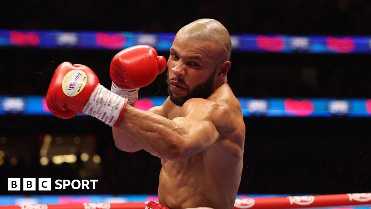 Eubank Jr throwing a left hook