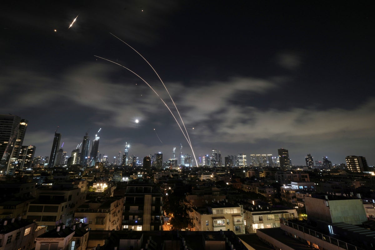 Britain withdraws families of embassy staff in Tel Aviv while thousands remain stranded