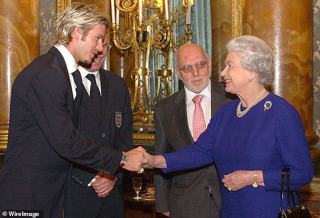 Special occasion: Behind-the-scenes footage of David Beckham from the day he met the queen and received his OBE in 2003 for services to football