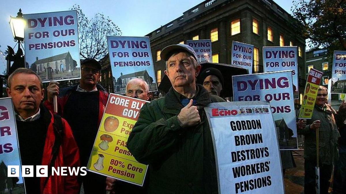 A group of men protesting in central London holding signs saying "Gordon Brown destroys workers' pensions" and "dying for our pensions".