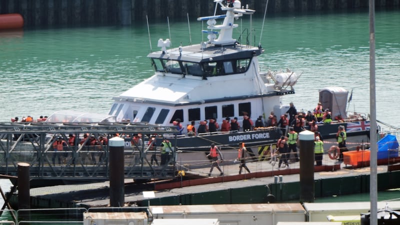 More than 900 people arrived in small boats on Friday