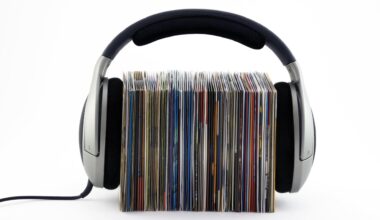 A stack of records with headphones on top of them