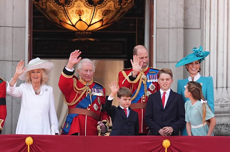 Queen Camilla, King Charles III, Prince Louis, the Prince of Wales, Prince George, the Princess of Wales and Princess Charlotte on the balcony of Buckingham Palace, London, to view the flypast (PA)