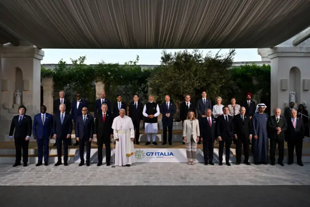 Pope Francis poses with the G7 heads of State