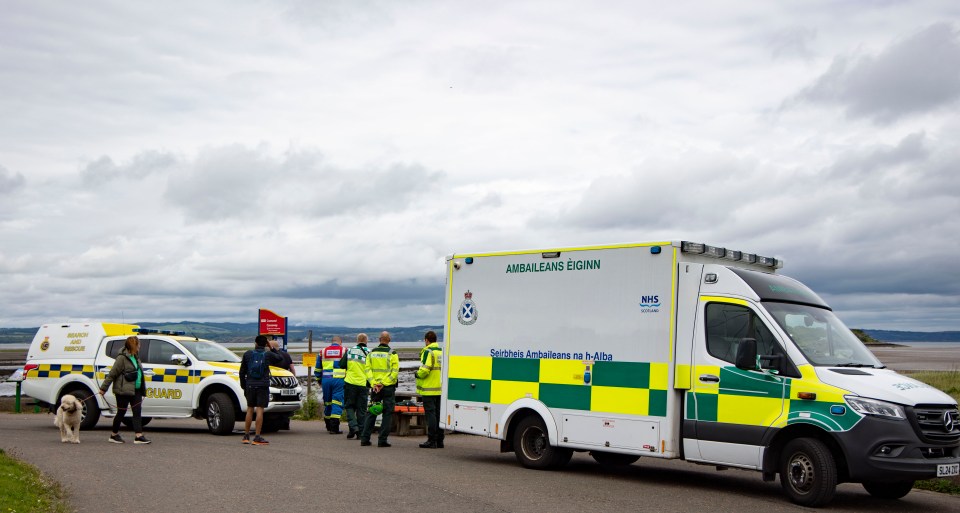 Rescue crews and an ambulance at Cramond Island.