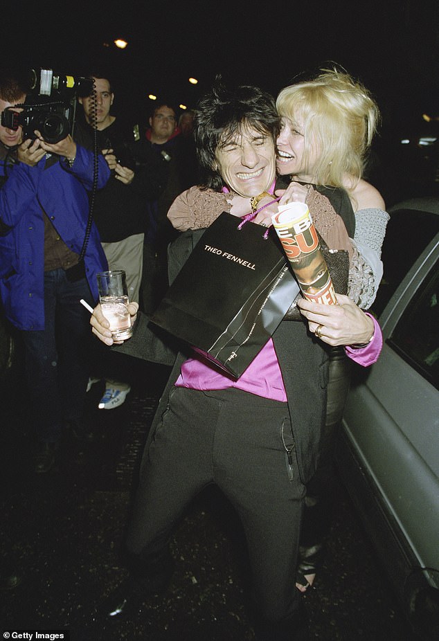 Jo revealed recently that she had an awkward run-in with her ex-husband during a trip to the Bahamas (pictured with Ronnie Wood in 1999)