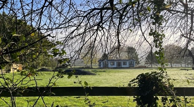 OXFORDSHIRE: A general view of the mobile home in a field in Goring-on-Thames that was set up opposite the village's cemetery