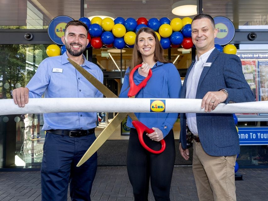 (L-R) Councillor Phillip Campbell (Chair of Newry, Mourne and Down District Council); Bethany Firth MBE; Gordon Cruikshanks (Regional Managing Director, Lidl Northern Ireland)