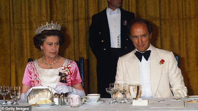 Queen Elizabeth and Canadian Prime Minister Pierre Trudeau attend a banquet on August 1, 1978, in Canada