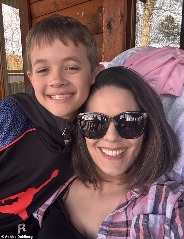 Liam's mother Ashlee (pictured together) said the pain was 'indescribable' as she lay with him after the medical team turned off life support