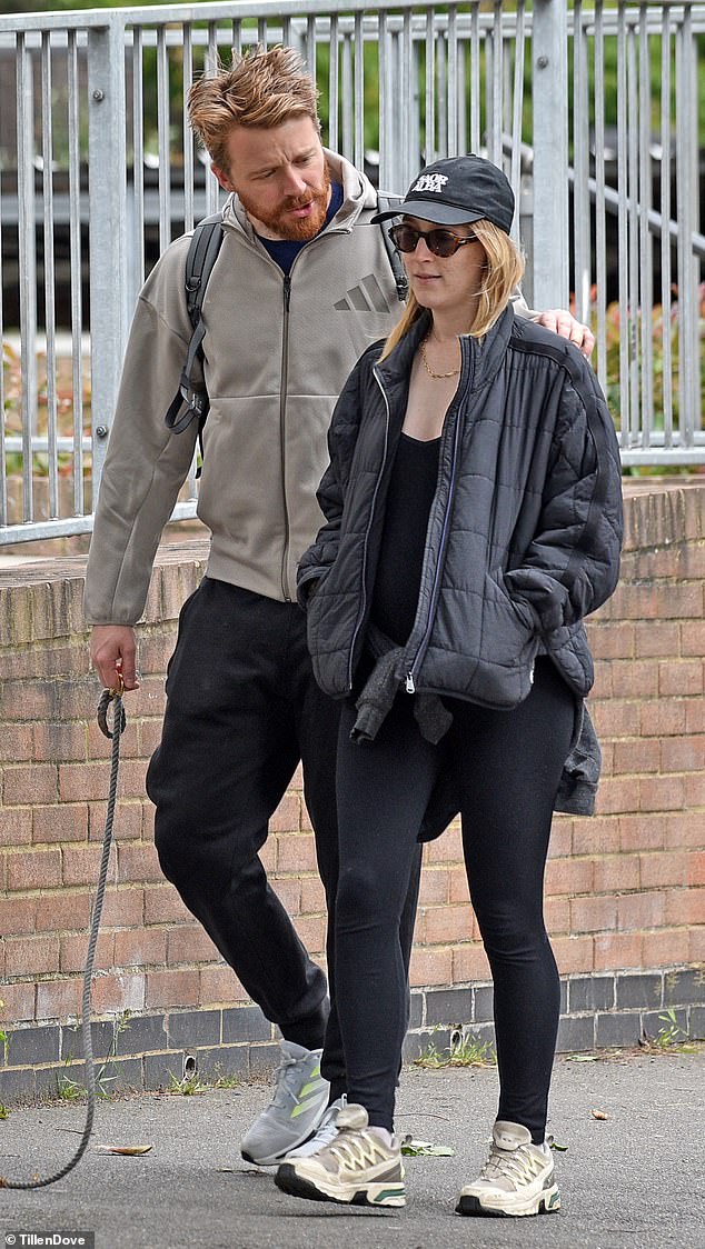 Lowden wore a casual Adidas jacket while Ronan sported leggings and a hoodie tied round her waist