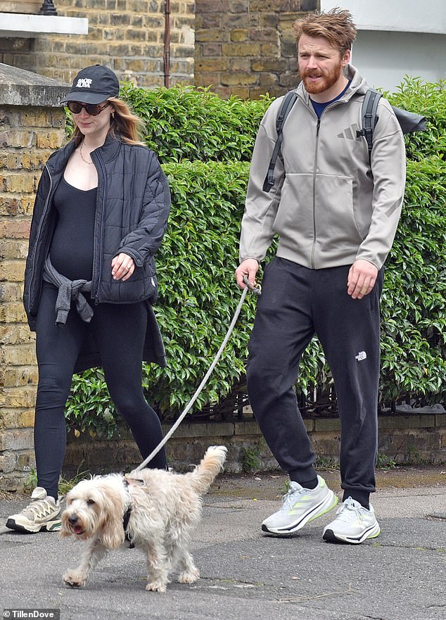 The pair brought their dog along on a walk in north London - perfectly in keeping with their laid-back relationship