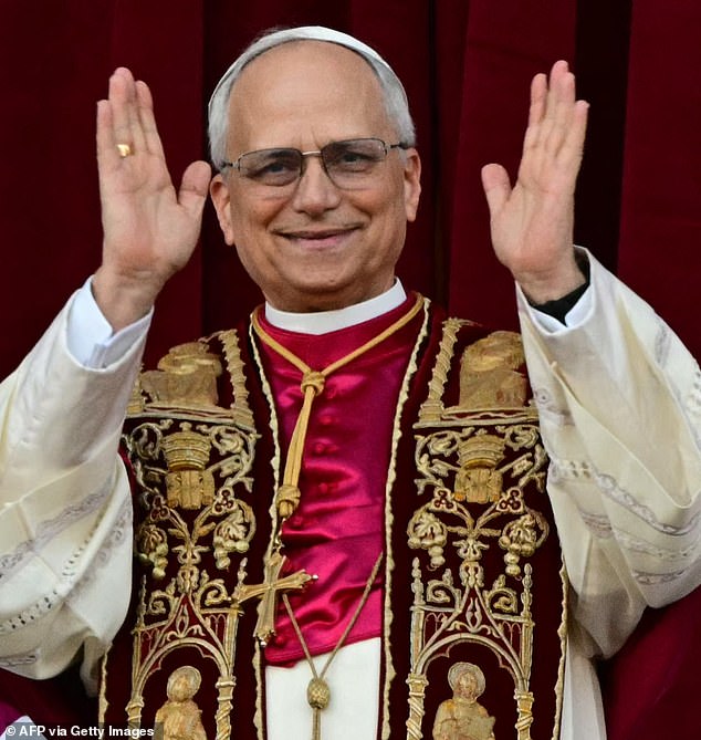Newly elected Pope Leo XIV, Robert Prevost addresses the crowd on the main central loggia balcony of the St Peter's Basilica for the first time