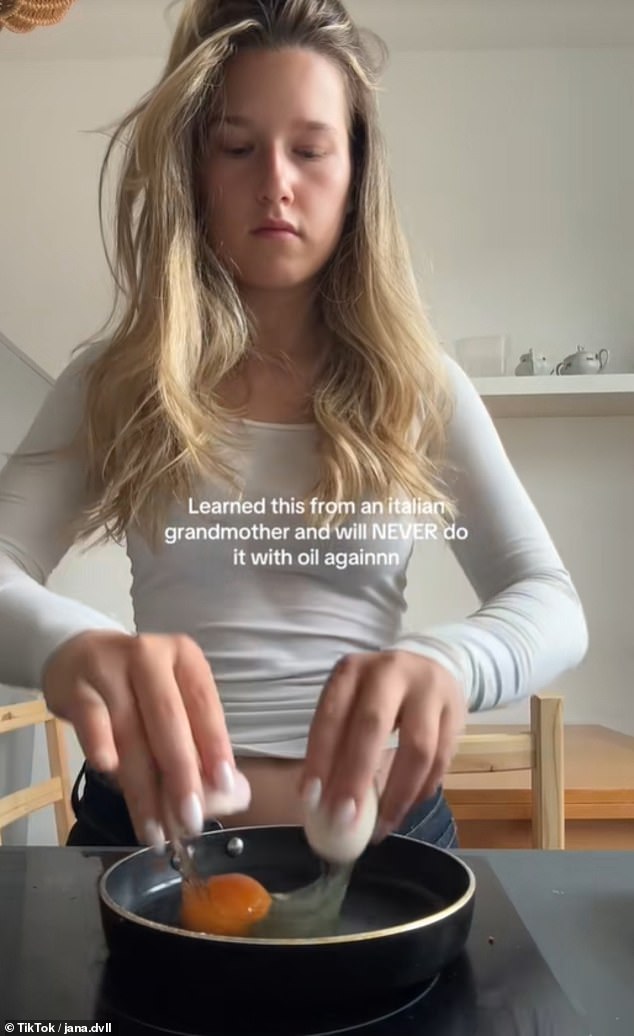 The Germany-based content creator shared a clip of herself rubbing the cut end of a whole cucumber on the surface of her frying pan, before cracking an egg into it