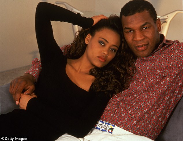 Heavyweight boxer Tyson pictured alongside Givens in Los Angeles, California in 1988