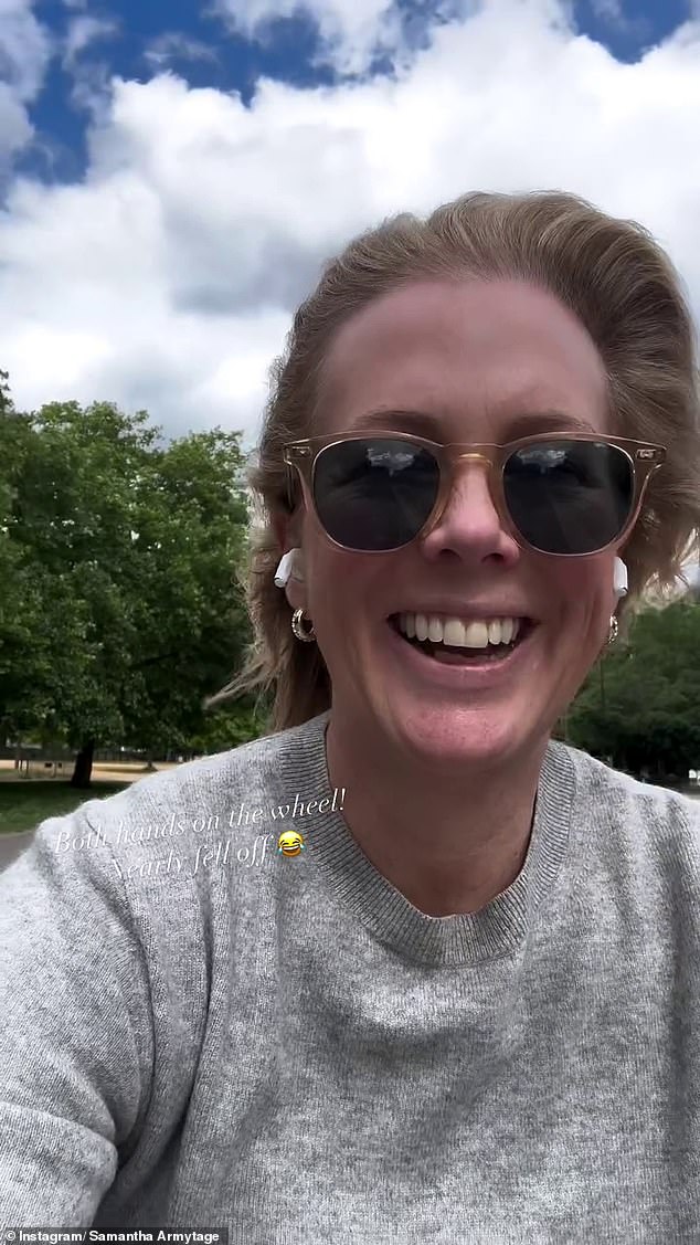 She shared a video to Instagram as she rode a bike through a park but she wasn't wearing a helmet and almost fell off