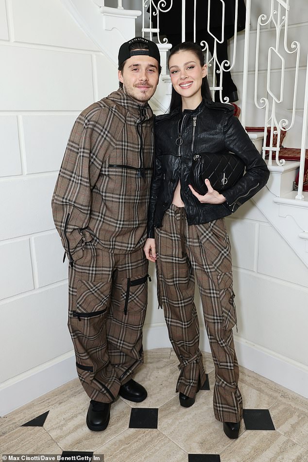 Brooklyn Beckham admitted he's inherited his parents' love of matching outfits as he gushed over his 'cool' wife Nicola Peltz amid his family feud (pictured in February)