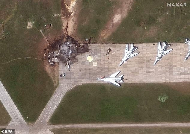 The strikes took place on Sunday, with footage released today showing flames engulfing aircraft at four military airfields (pictured Belaya Airbase)