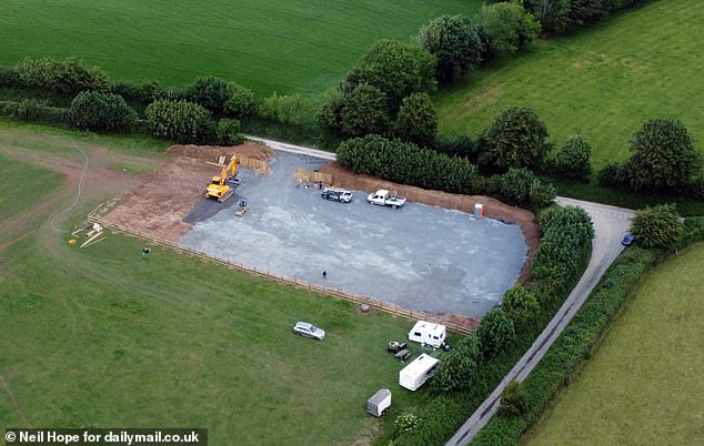 DEVON: A field in a rural patch of north Devon countryside has been ripped apart by bulldozers and turned into a suspected traveller camp (pictured on Wednesday)