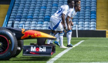 Three Leeds United players raced a Red Bull Formula One car on the Elland Road turf