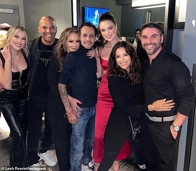 In 2022, Leah shared a snap of herself happily hanging out with Jennifer's third ex-husband Marc Anthony (M) and his much younger fourth wife Nadia Ferreira Muñiz (3-R)