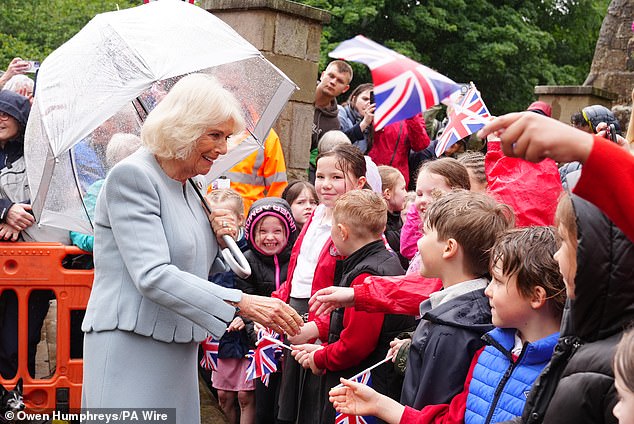 Despite the downpour, Camilla, who took shelter under a sheer umbrella, was on jolly form and smiled broadly as she chatted to locals after touring privately-owned Hexham Racecourse - Northumberland's only track last week