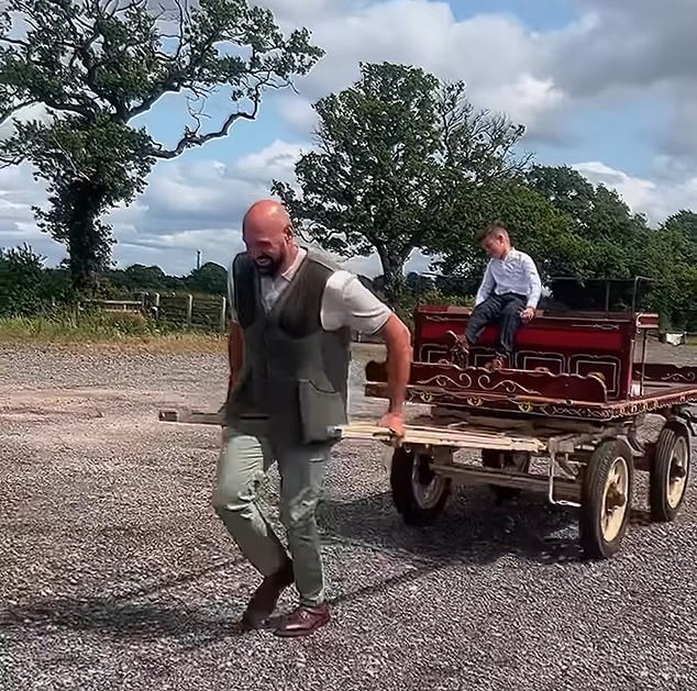 Tyson Fury shared footage of him pulling his son along in a beautifully decorated horse trailer