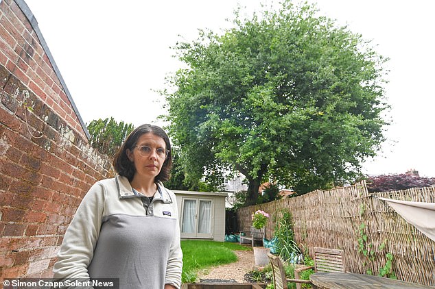 Orla Williams, 40, (pictured) and her partner moved into the terraced Grade II Listed home on Canon Street two years ago and applied to have the tree felled
