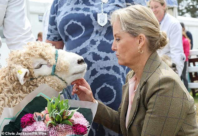 Sophie with a prize-winning sheep she later praised as 'very lovely'