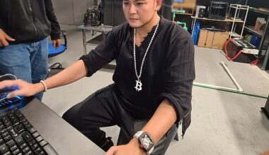 Herbert Sim (pictured) works with his company's transhuman helmet, turning his brainwaves into readable actions for a computer
