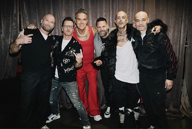 Five sent fans into frenzy as they surprised fans on stage at Robbie Williams' stadium gig in London on Friday night - marking the band's first live performance in 25 years