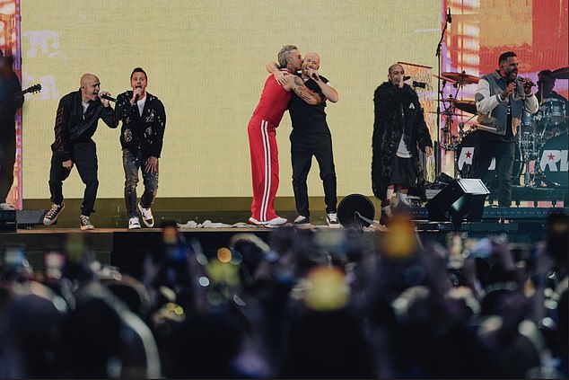 Marking the band's first live performance in 25 years, the iconic Noughties boyband brought a vibrant energy to the Emirates Stadium as they sang KEEP ON MOVIN