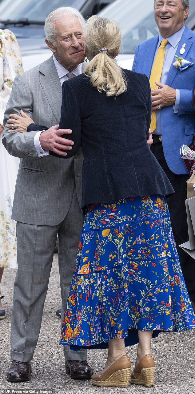 The King was pictured embracing his sister in law as the two both attended the Royal Windsor Flower Show on Saturday