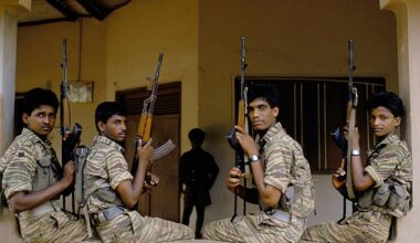An asylum seeker who allegedly recruited child soldiers for the Tamil Tigers terrorist group has won an appeal (pictured: Tamil Tigers fighters in a stock photo)