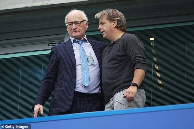 A new book claims Ratcliffe tried to convince Bruce Buck (left) to sell Chelsea to him, but the Blues ended up selling to a consortium led by Todd Boehly (right)
