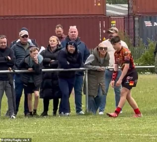 A group of spectators were seen stood behind the young player and appeared to jeer him as he took a kick at goal during the West Bank Bears game against the Myton Warriors Greens