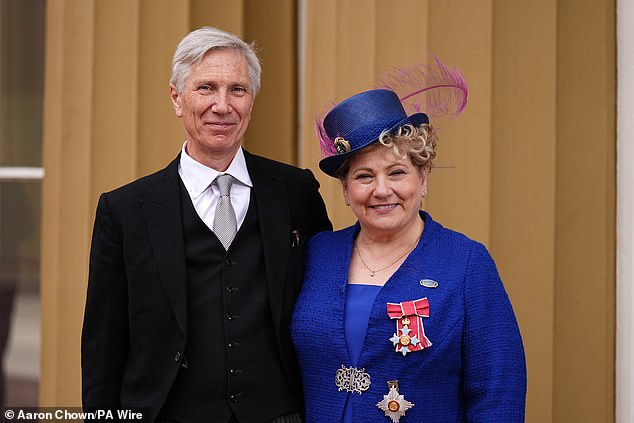 She was joined by her husband Christopher Nugee at the ceremony and the couple posed together after Dame Emily received her honour