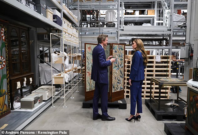 The princess cut a trendy figure as she opted to rewear a chic trouser suit by designer Alexander McQueen for the event, along with a white scoop-neck top