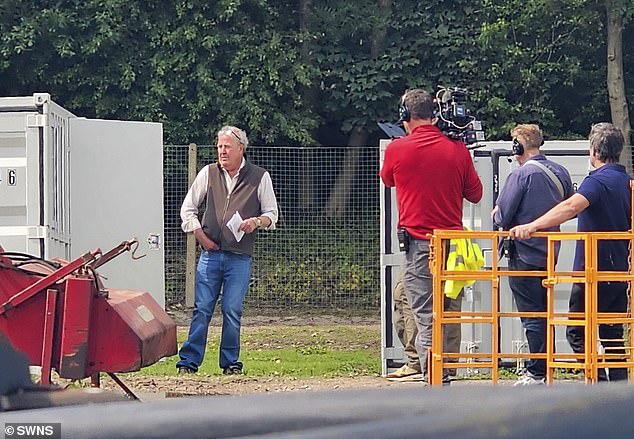 A large film crew was seen with Clarkson and Cooper as they attended the auction to sell his colossal £85,000 tractor
