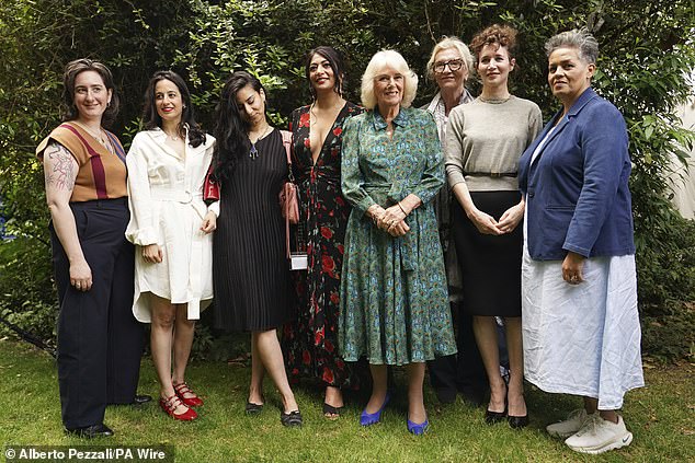 The royal, 77, beamed as she met with the short-listed authors at the event today in Bloomsbury