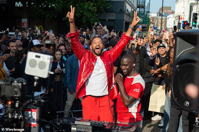 Will later joined the party and stood out from the crowd in a red leather jacket as they delighted fans with some hits