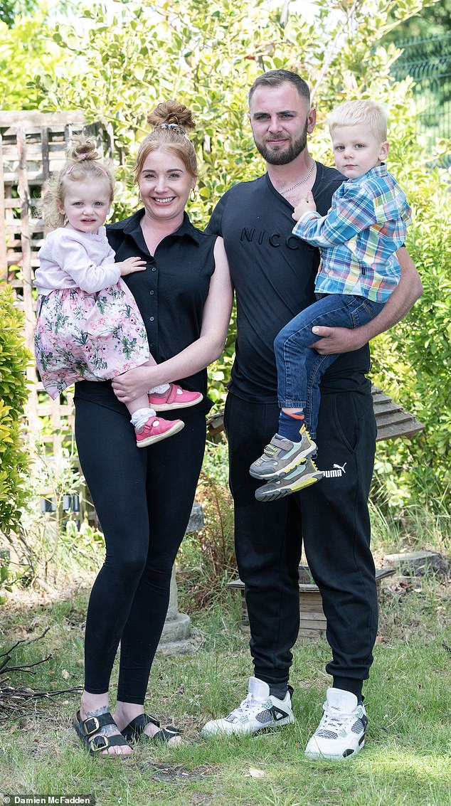 Luke with his partner Alix and children Lucas and Ivy. Fifteen months on, he says he is back at work fixing cars and tractors